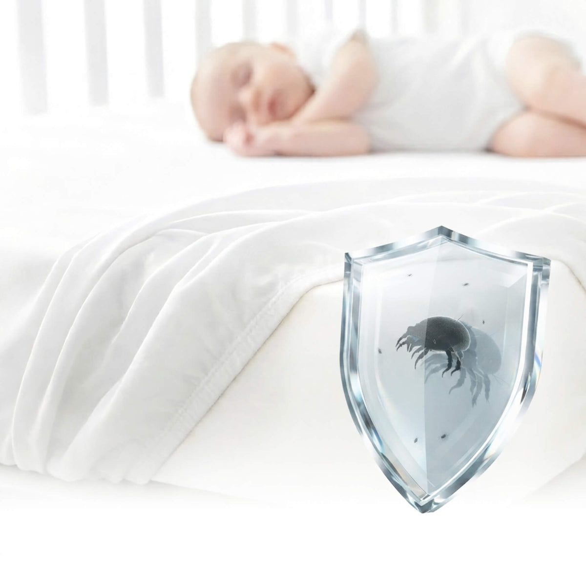 Hypoallergenic baby mattress protector fitted under a soft organic cotton crib sheet